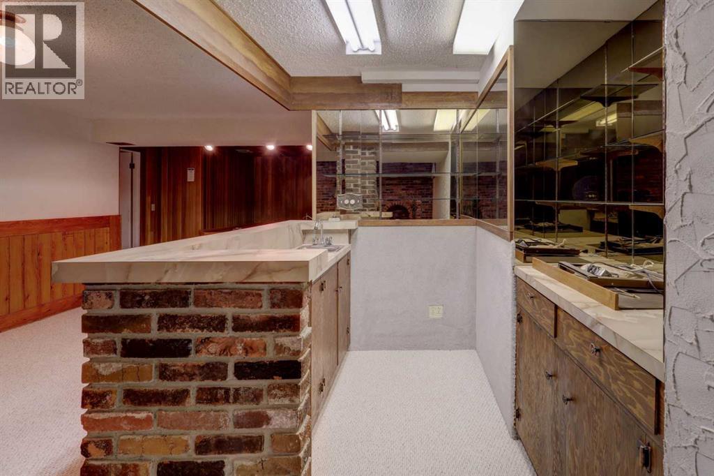 Photo 10 of 5601 Dalcastle Hill Nw, Calgary AB