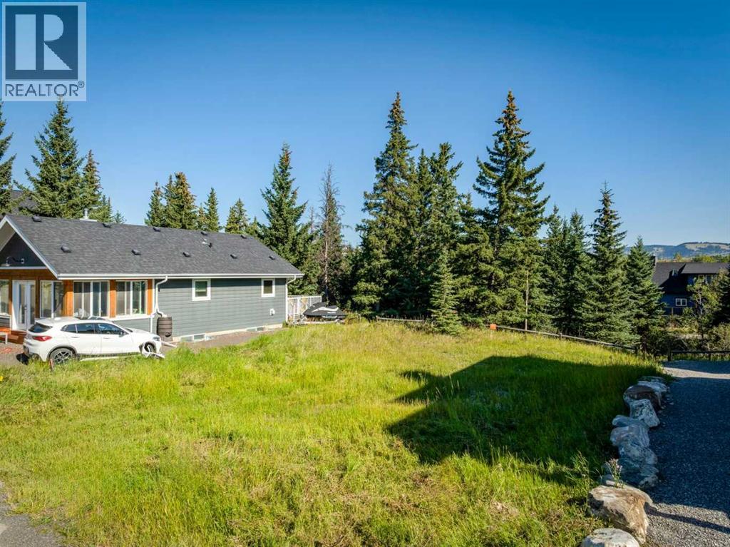 Photo 10 of 404 Cottageclub Grove, Rural Rocky View County AB