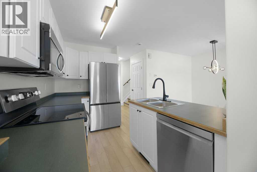Photo 4 of 14 73 Addington Drive, Red Deer AB