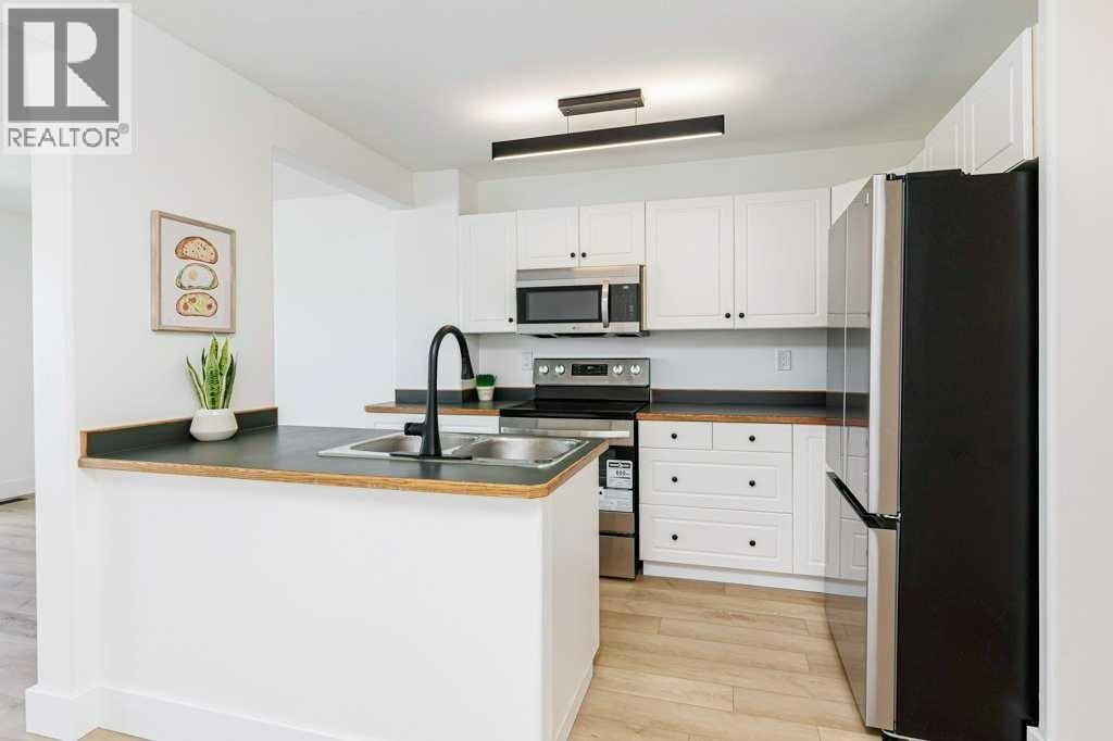 Photo 9 of 14 73 Addington Drive, Red Deer AB