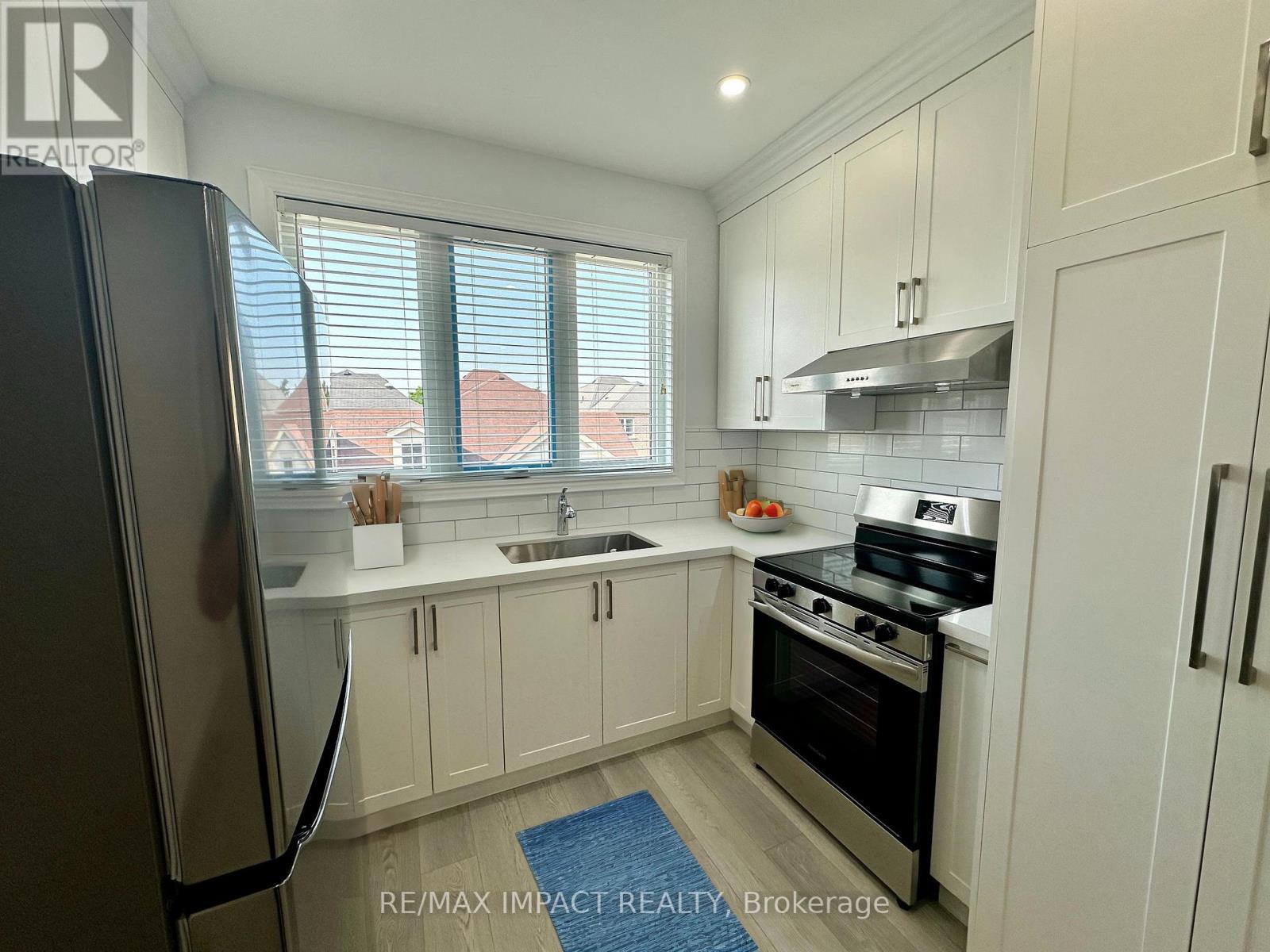 Photo 24 of Coach 32 Toulouse Court, Markham ON