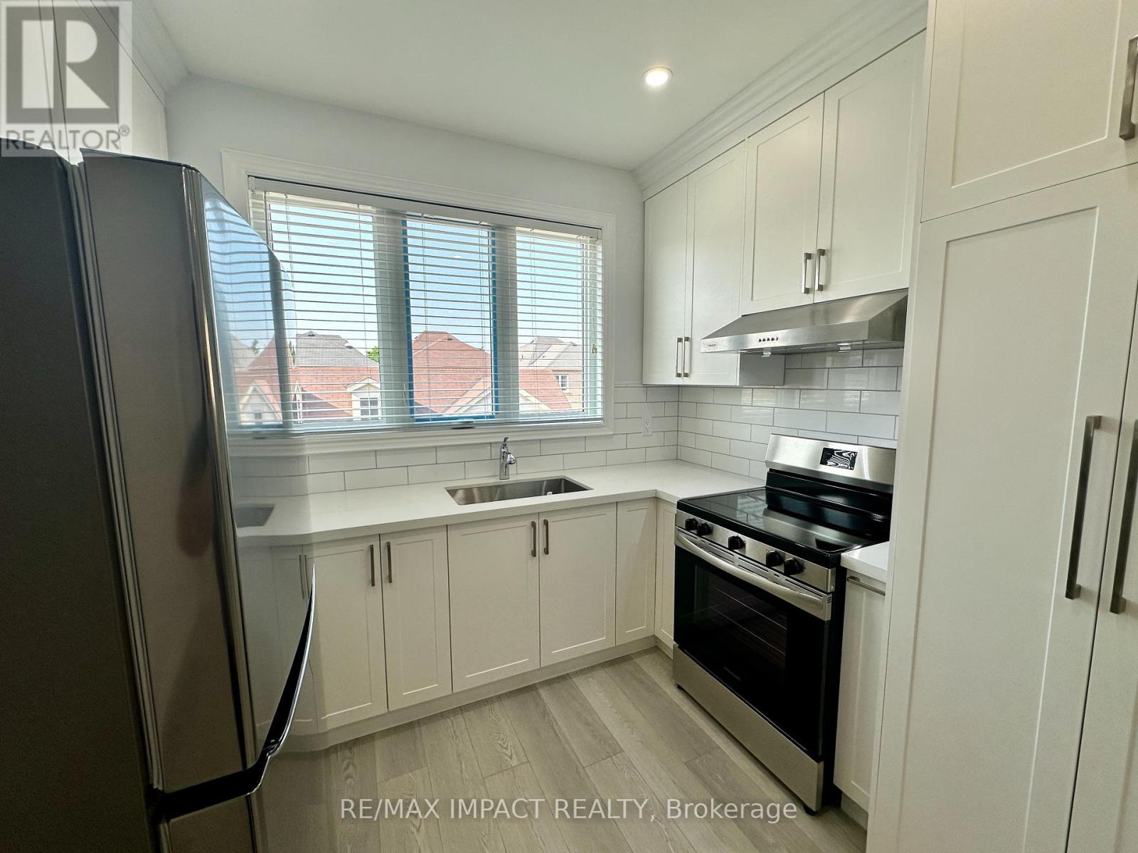 Photo 7 of Coach 32 Toulouse Court, Markham ON