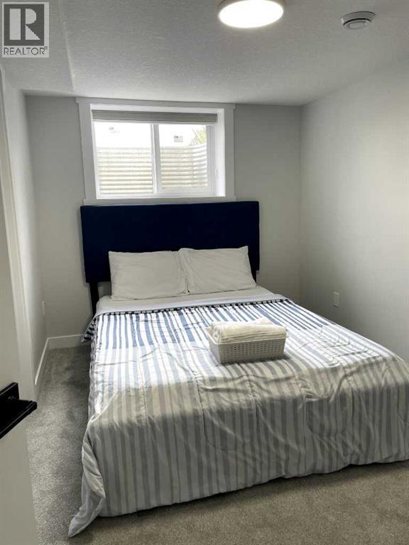 Photo 23 of 222 Aquila Drive Nw, Calgary AB