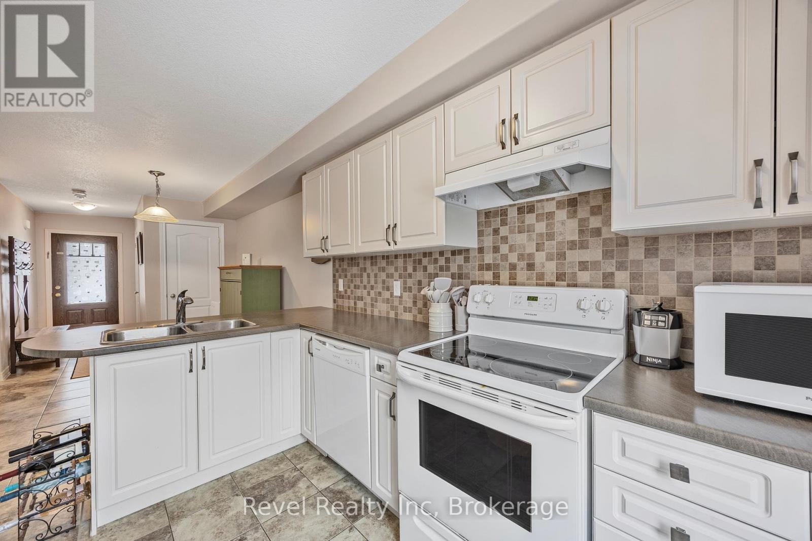 Photo 4 of 1041 Cook Drive, Midland ON