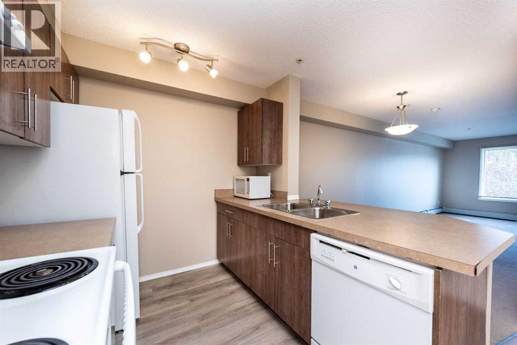 Photo 29 of 4210 403 Mackenzie Way Sw, Airdrie AB