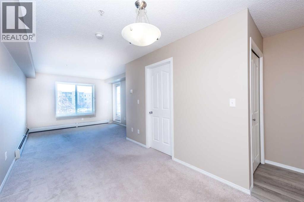 Photo 1 of 4210 403 Mackenzie Way Sw, Airdrie AB