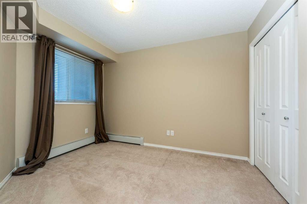 Photo 9 of 4210 403 Mackenzie Way Sw, Airdrie AB