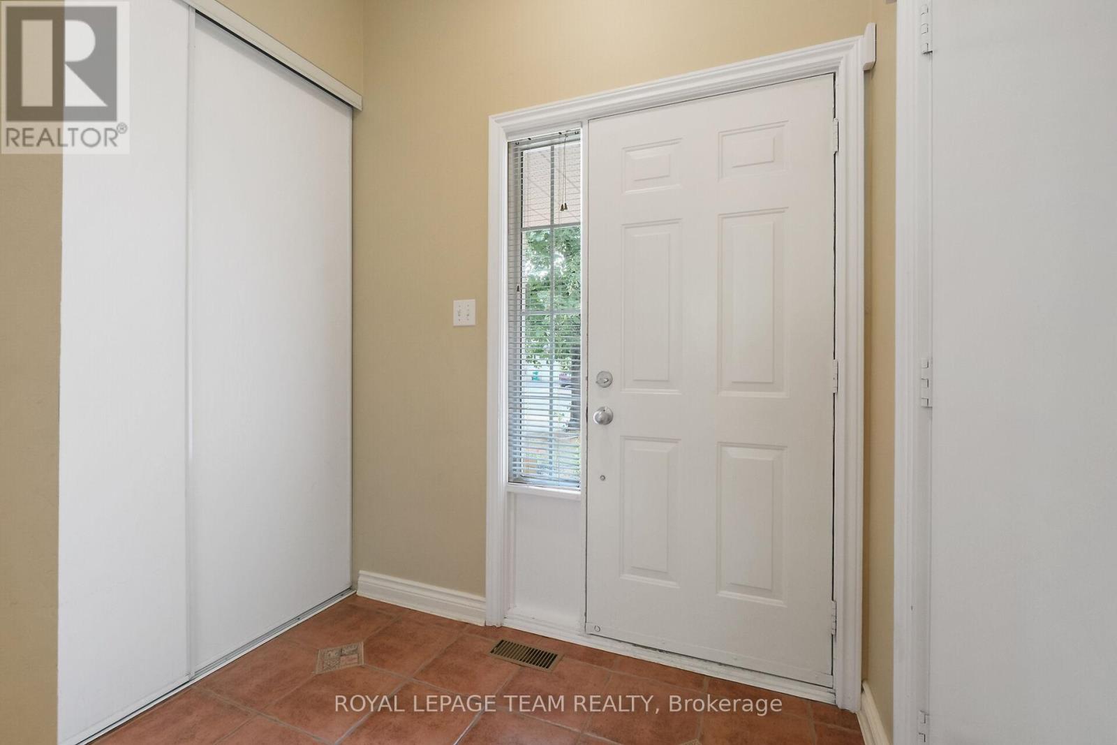 Tiled Foyer with large closet.