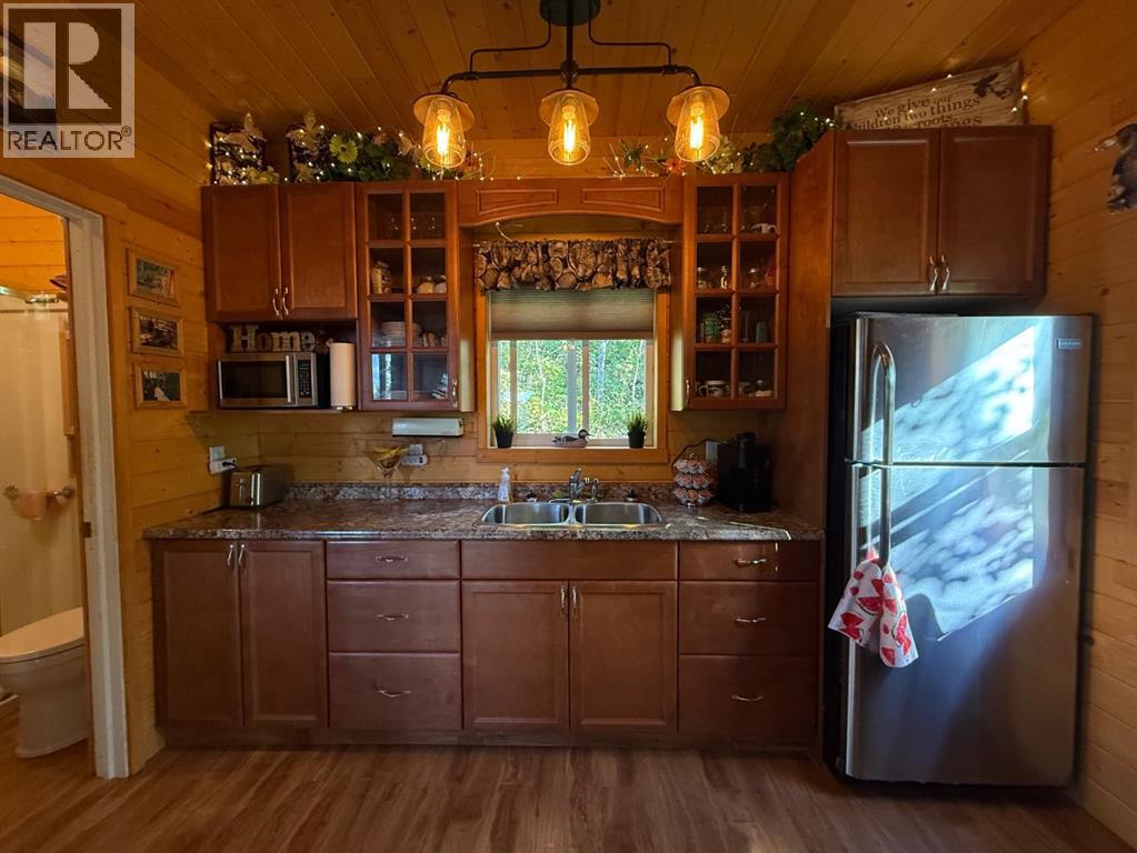 Photo 7 of 621 Diamond Willow Drive, Lac Des Iles SK