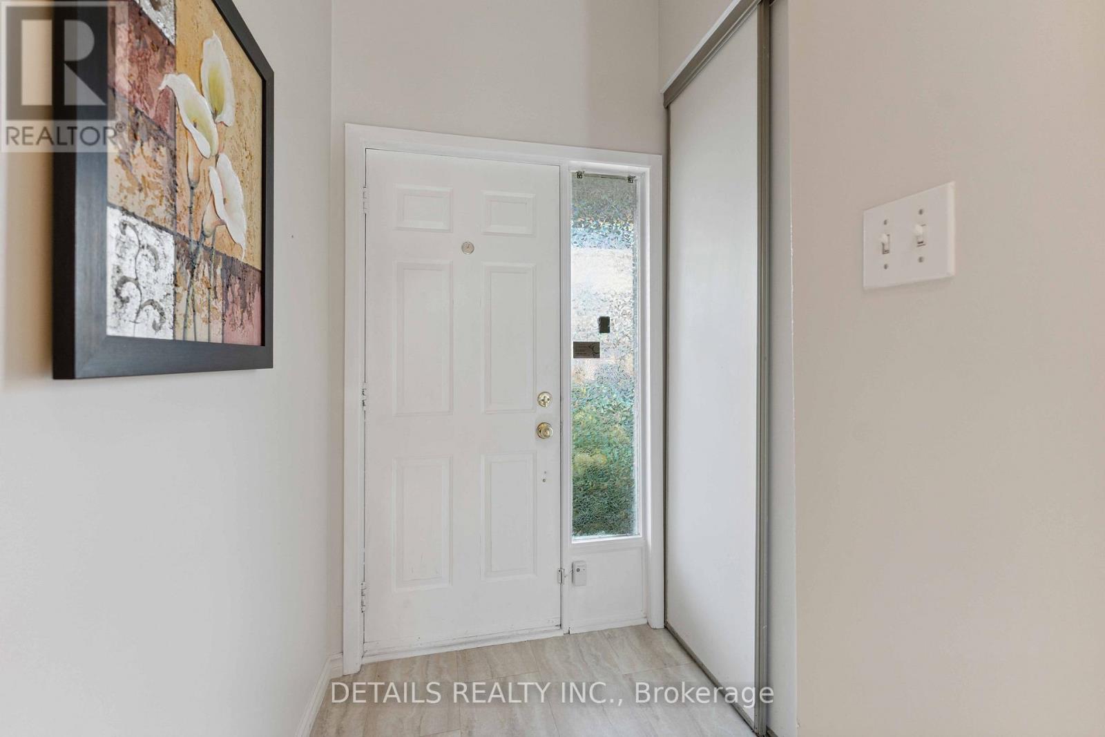 Foyer w access to garage and powder room