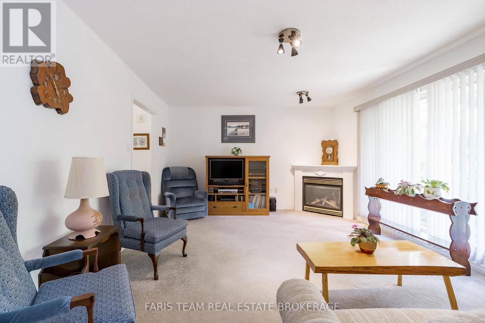 Photo 1 of 21 Forest Hill Drive, Springwater ON