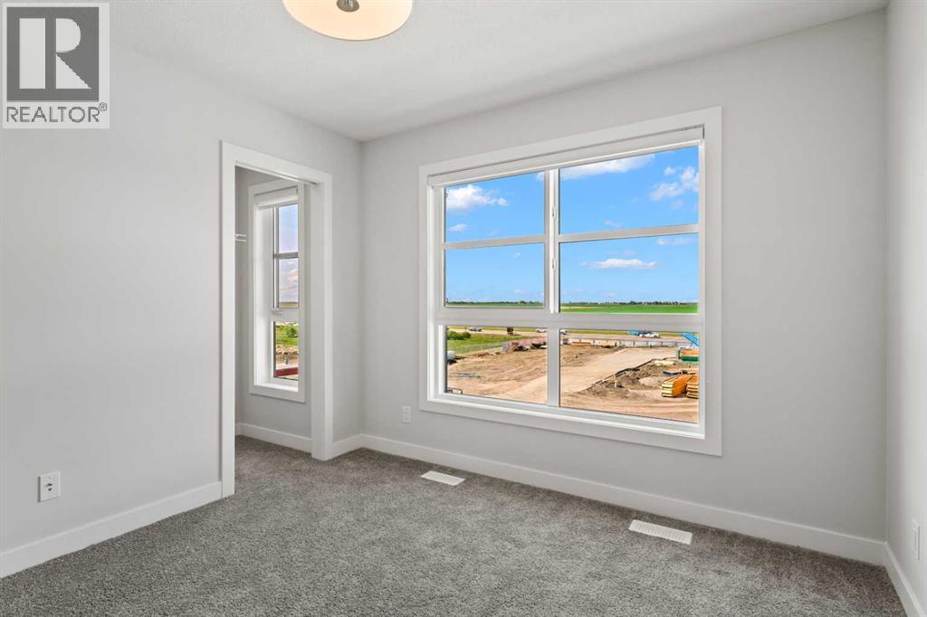Photo 17 of 113 285 Chelsea Court, Chestermere AB