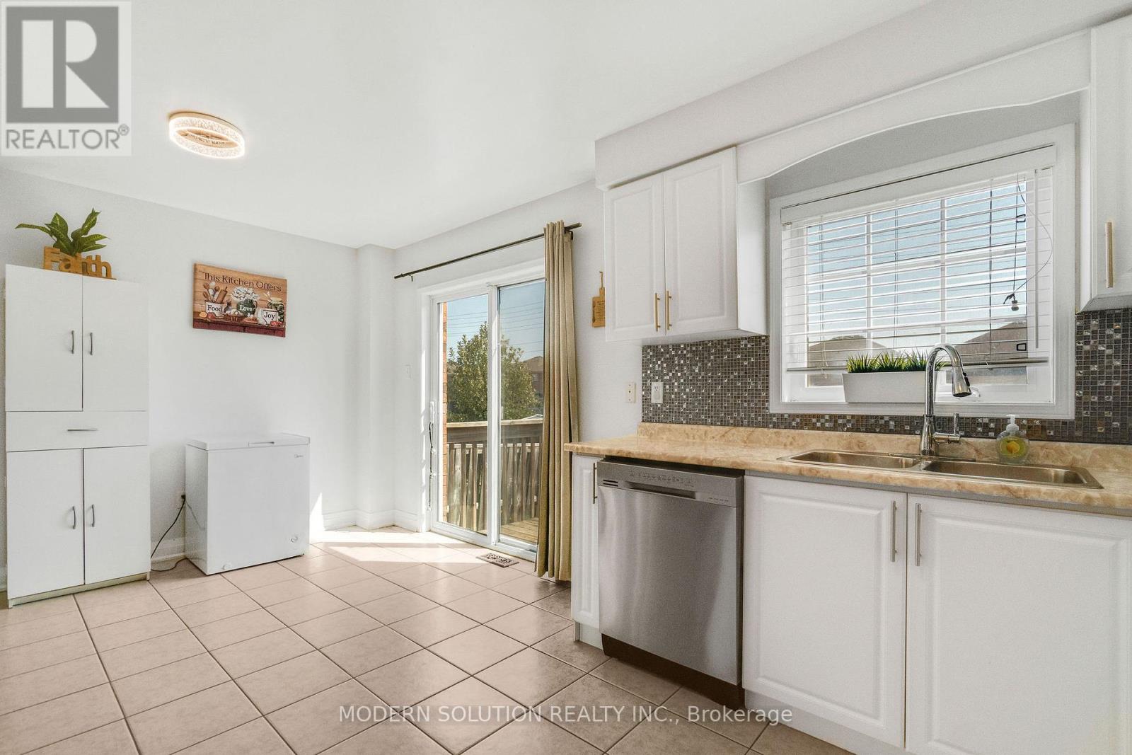 Photo 31 of 67 Roundstone Drive, Brampton ON