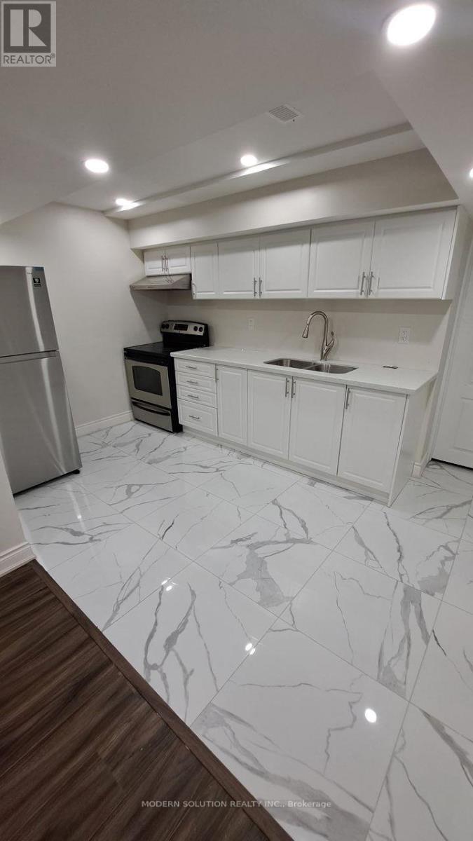 Photo 35 of 67 Roundstone Drive, Brampton ON
