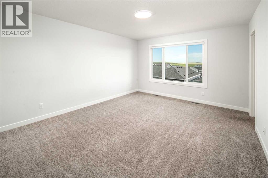 Photo 11 of 159 Ambleside Crescent Nw, Calgary AB