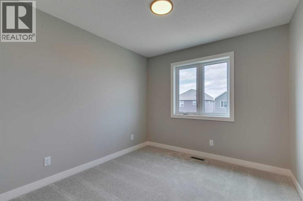 Photo 5 of 469 Hotchkiss Drive Sw, Calgary AB