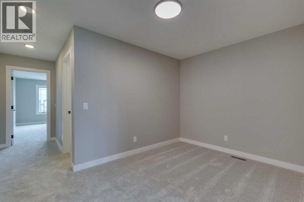 Photo 9 of 469 Hotchkiss Drive Sw, Calgary AB