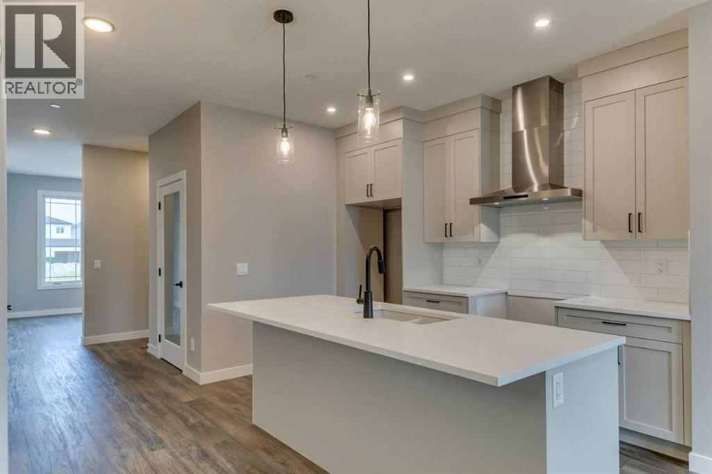 Photo 11 of 469 Hotchkiss Drive Sw, Calgary AB