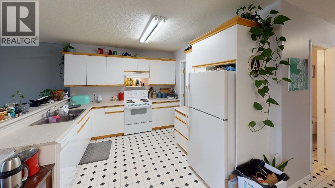 Photo 9 of 9306 94 Avenue, Fort St John BC