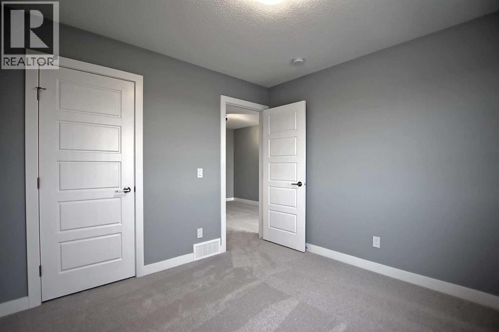 Photo 11 of 47 Agate Road, Cochrane AB