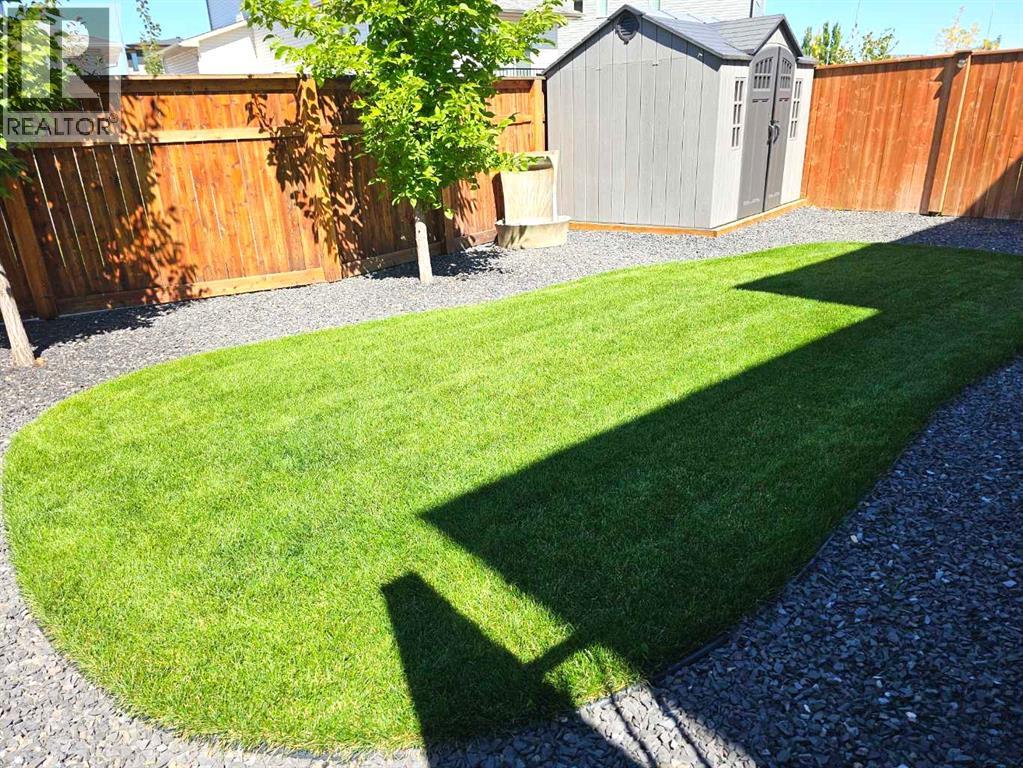 Photo 5 of 119 Goldenrod Road W, Lethbridge AB