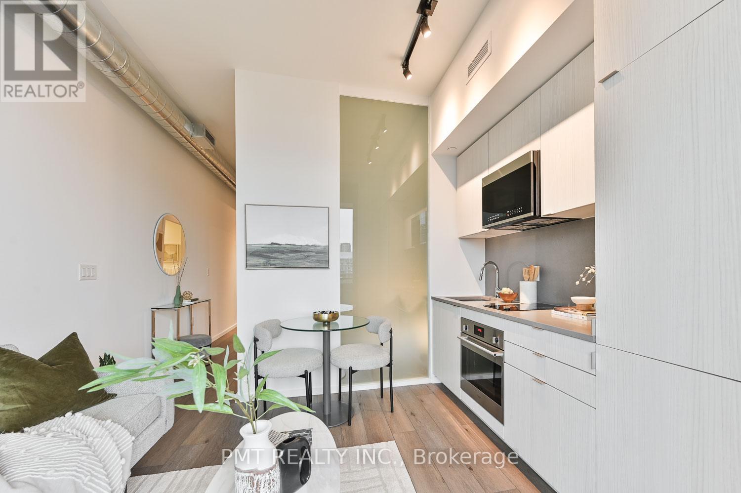 Photo 5 of 610 21 Lawren Harris Square, Toronto ON