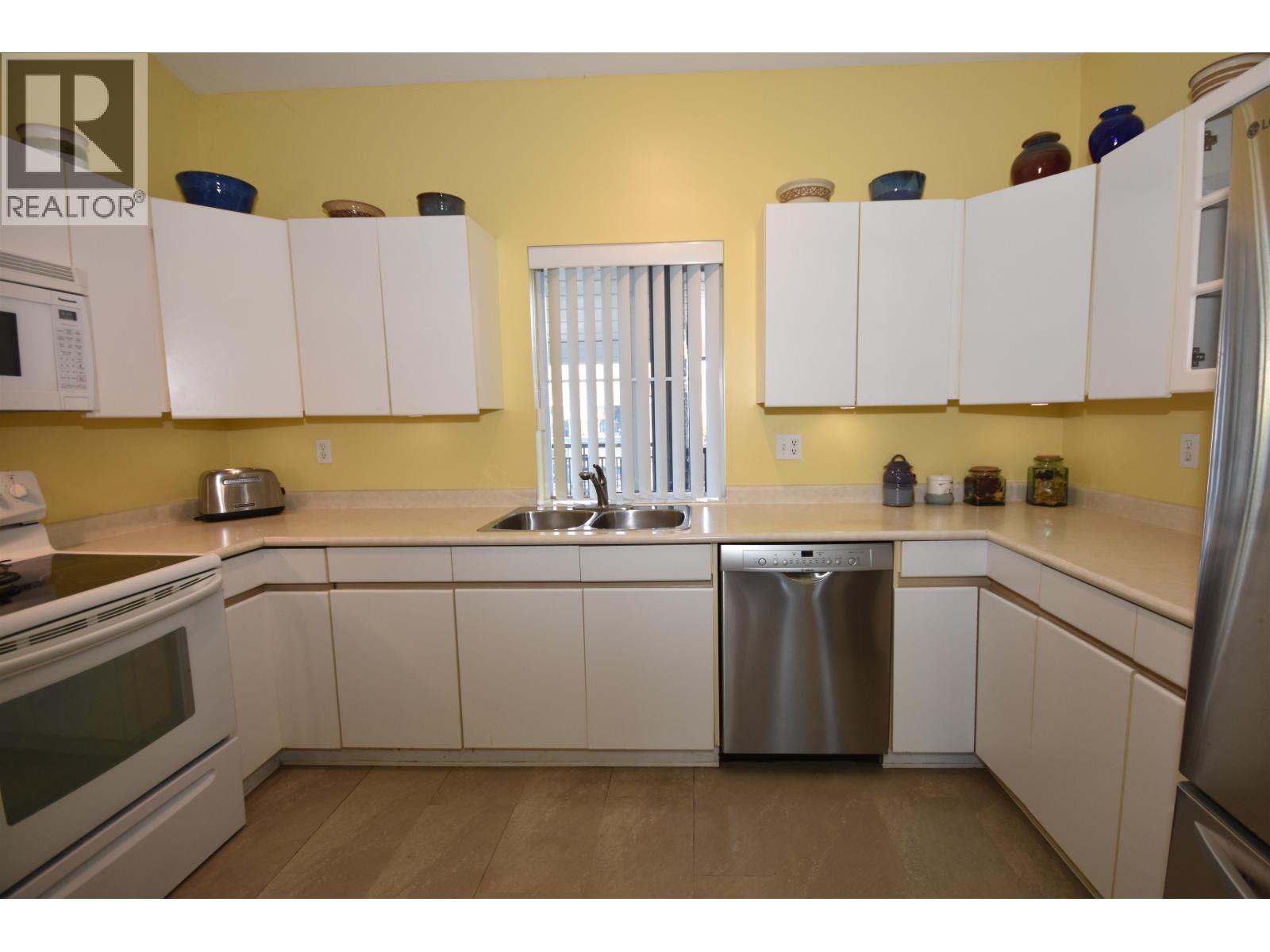 #302-4955 RIVER Road, Delta
