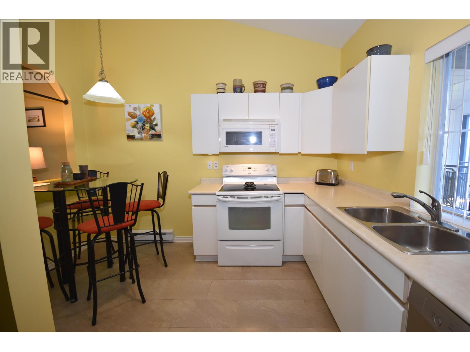 #302-4955 RIVER Road, Delta
