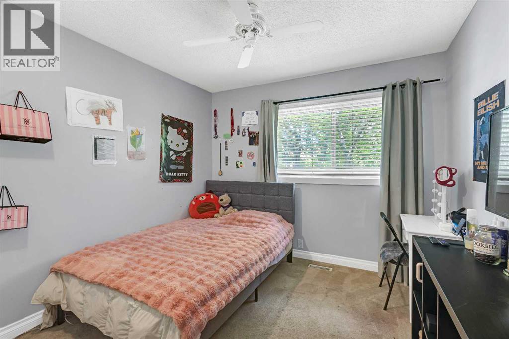 Single Family House Bi-level for Sale in  Brookpark Drive SW Braeside Calgary 