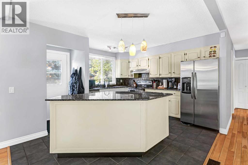Single Family House Bi-level for Sale in  Brookpark Drive SW Braeside Calgary 
