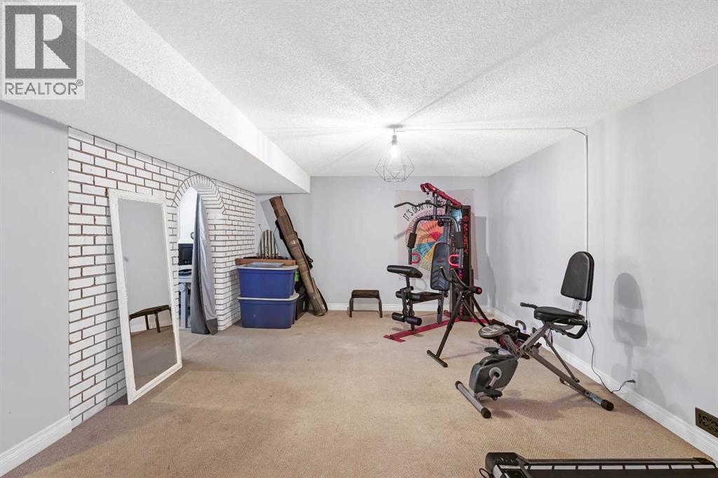 Single Family House Bi-level for Sale in  Brookpark Drive SW Braeside Calgary 