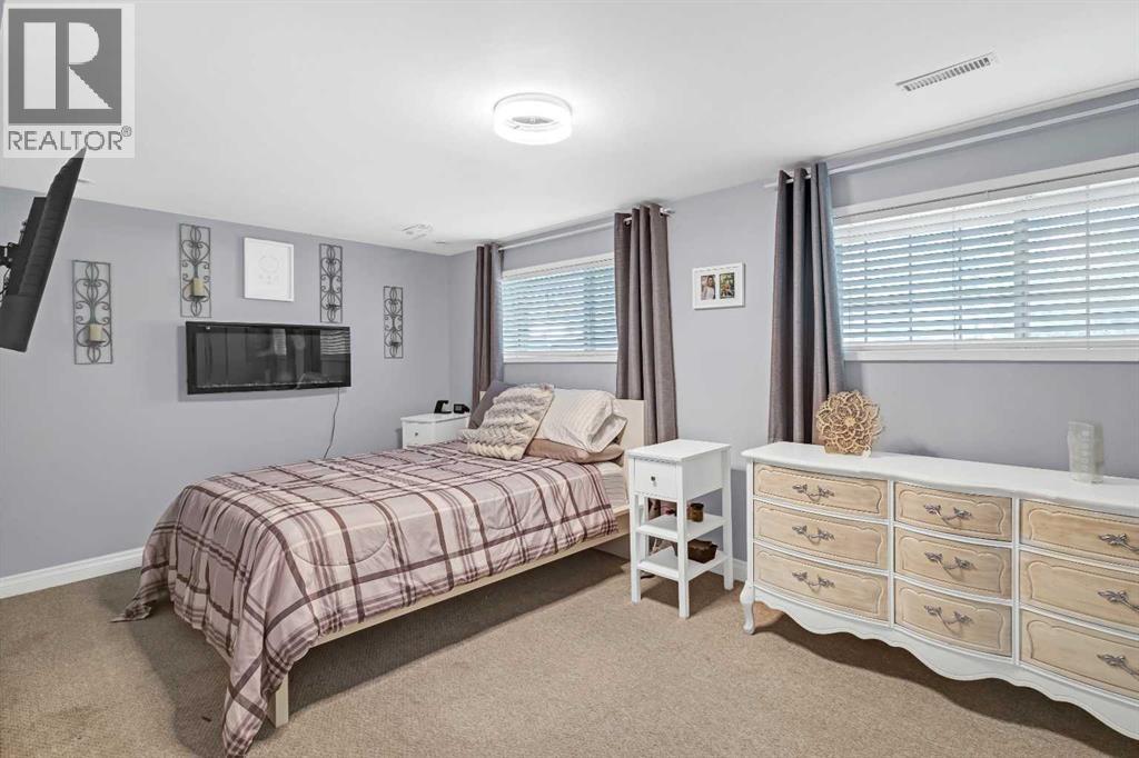 Single Family House Bi-level for Sale in  Brookpark Drive SW Braeside Calgary 