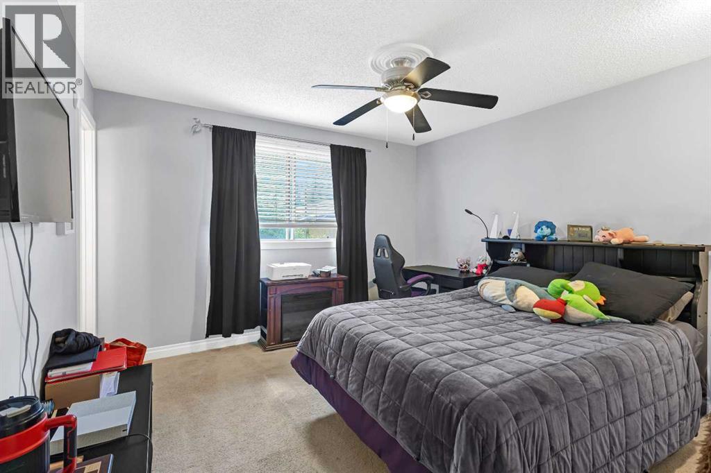 Single Family House Bi-level for Sale in  Brookpark Drive SW Braeside Calgary 