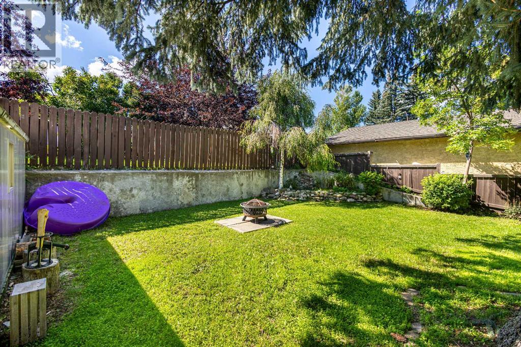 Single Family House Bi-level for Sale in  Brookpark Drive SW Braeside Calgary 