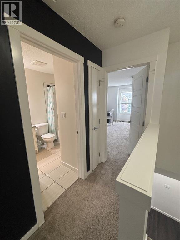 Photo 9 of 1513 2400 Ravenswood View Se, Airdrie AB