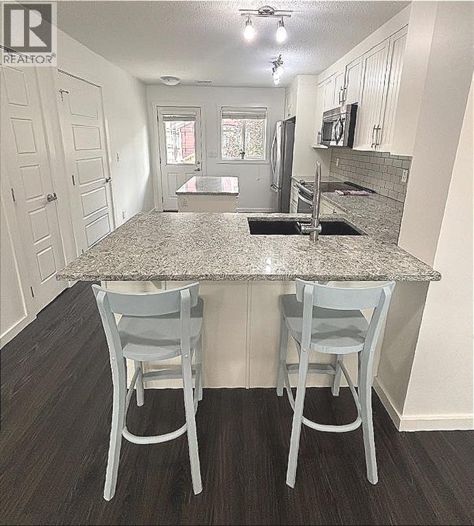 Photo 15 of 1513 2400 Ravenswood View Se, Airdrie AB