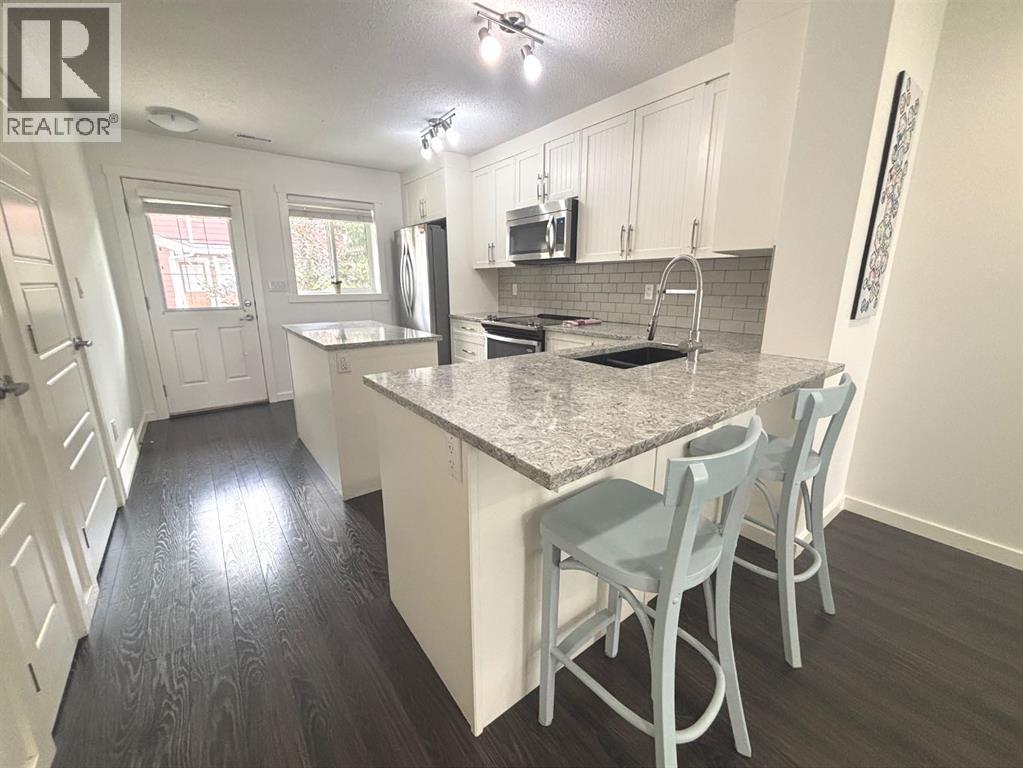 Photo 10 of 1513 2400 Ravenswood View Se, Airdrie AB