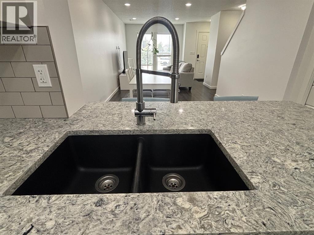 Photo 16 of 1513 2400 Ravenswood View Se, Airdrie AB