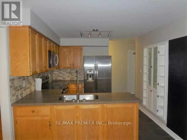 Photo 15 of Main 49 Bassett Boulevard, Whitby ON