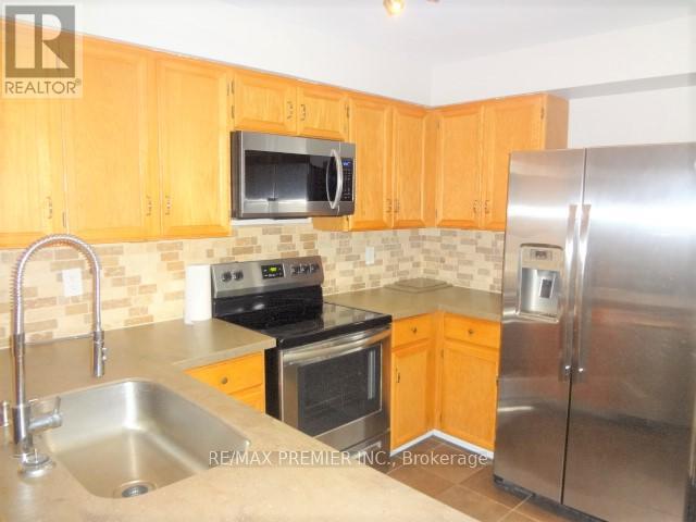 Photo 9 of Main 49 Bassett Boulevard, Whitby ON