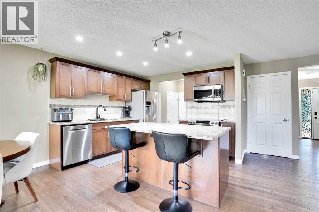 Photo 16 of 174 Windstone Avenue Sw, Airdrie AB