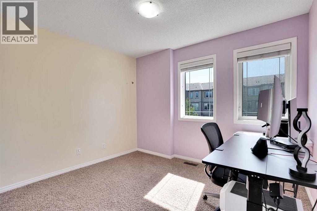 Photo 25 of 174 Windstone Avenue Sw, Airdrie AB