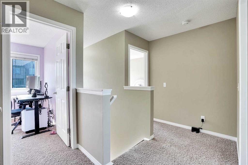Photo 3 of 174 Windstone Avenue Sw, Airdrie AB