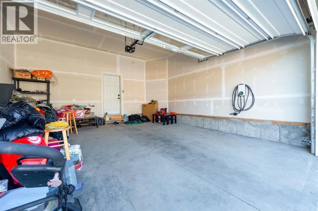 Photo 17 of 633 Windrow Manor Sw, Airdrie AB