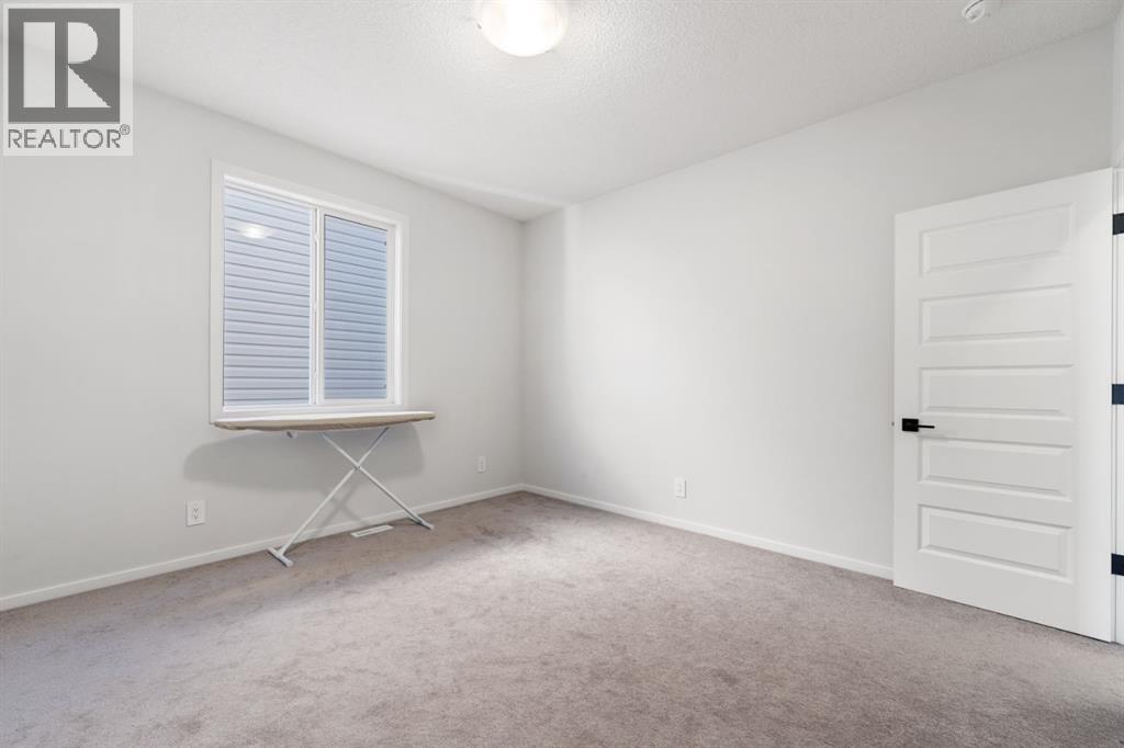 Photo 11 of 633 Windrow Manor Sw, Airdrie AB