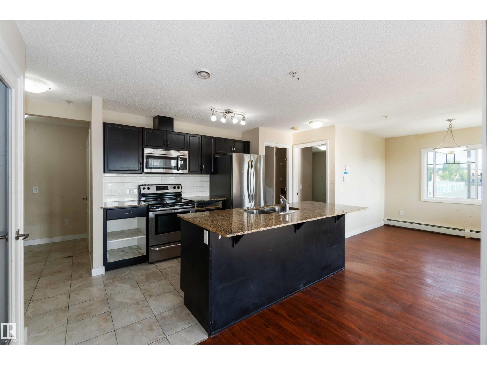 Photo 23 of 214 12660 142 Av Nw, Edmonton AB