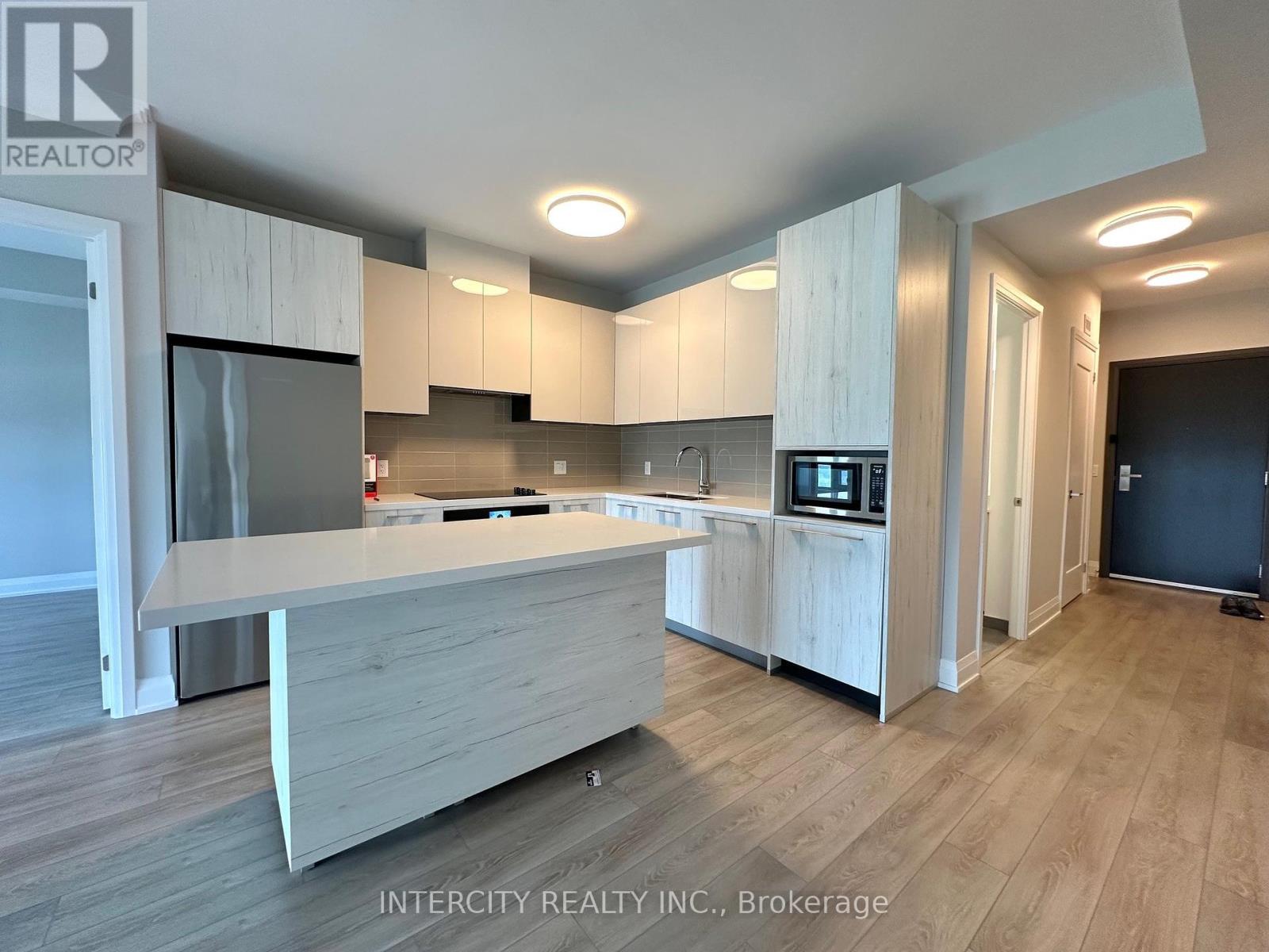 Photo 3 of 1806 18 Water Walk Drive, Markham ON