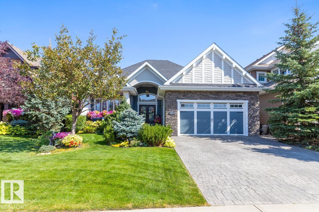 Photo 1 of 4023 Whispering River Dr Nw, Edmonton AB
