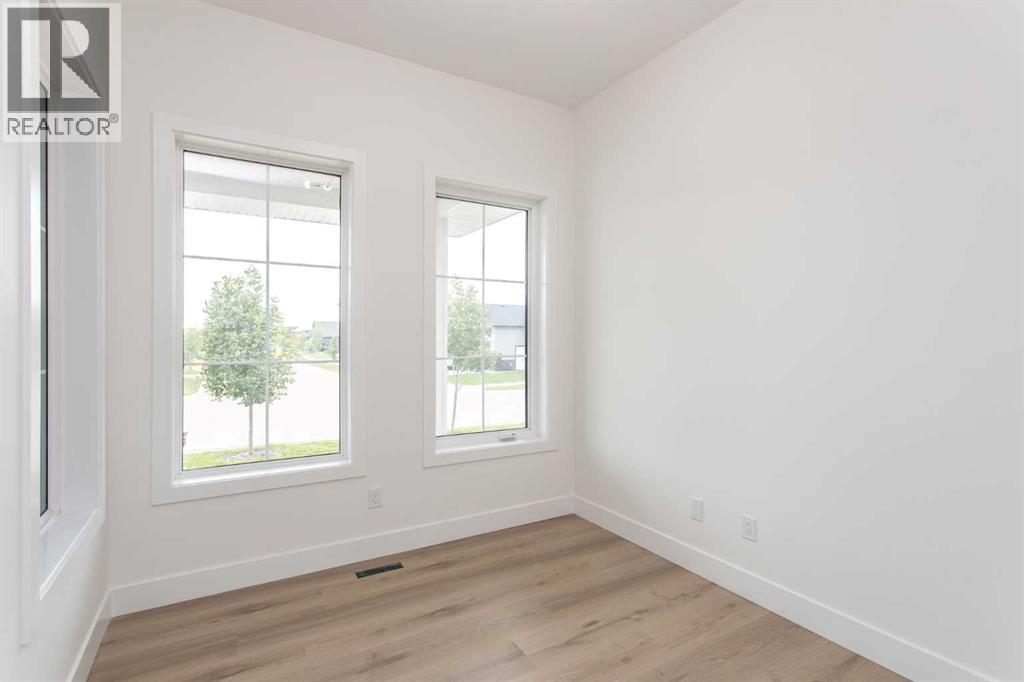 Photo 13 of 17 Thatcher Avenue, Red Deer AB