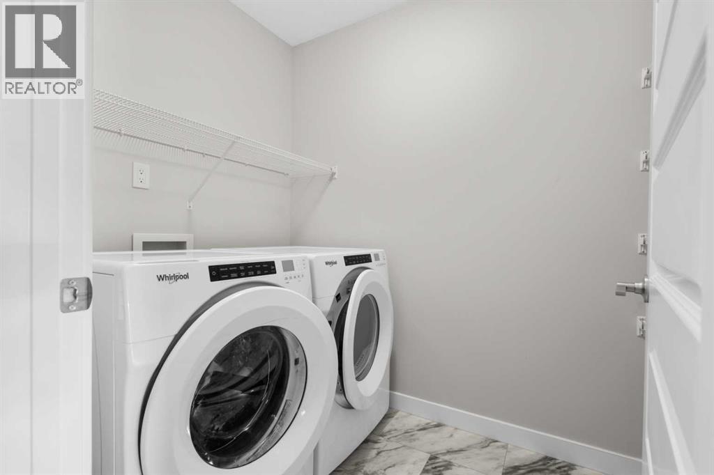 Photo 6 of 1117 Bayview Gardens Sw, Airdrie AB